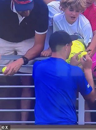 101665963-15049149-Kamil_Majchrzak_was_signing_autographs_for_young_fans_after_his_-a-9_175653135889.jpeg