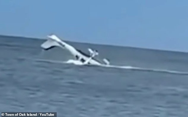 101683373-15049009-Dramatic_footage_showed_the_rescue_of_a_pilot_from_a_plane_crash-a-6_175653161181.jpeg