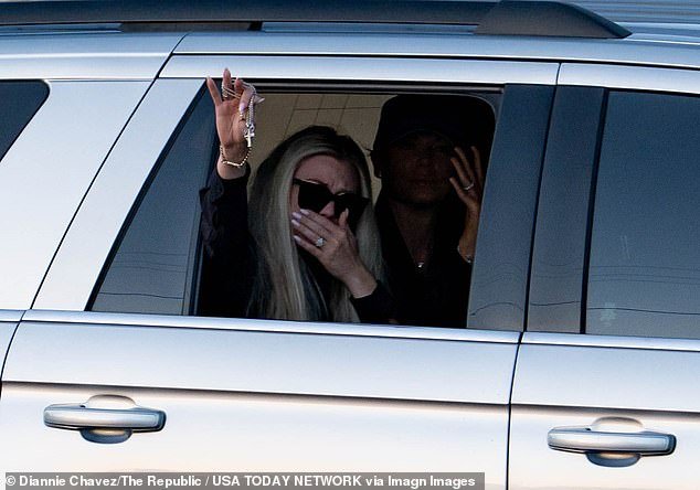 102079267-15091983-Erika_Kirk_waved_to_the_supporters_from_an_SUV_on_Thursday_eveni-a-29_17576911331.jpeg