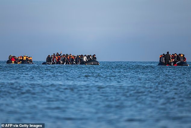 103910509-15294237-Migrants_crossing_the_Channel_on_inflatable_boats-a-41_1763239272974.jpg